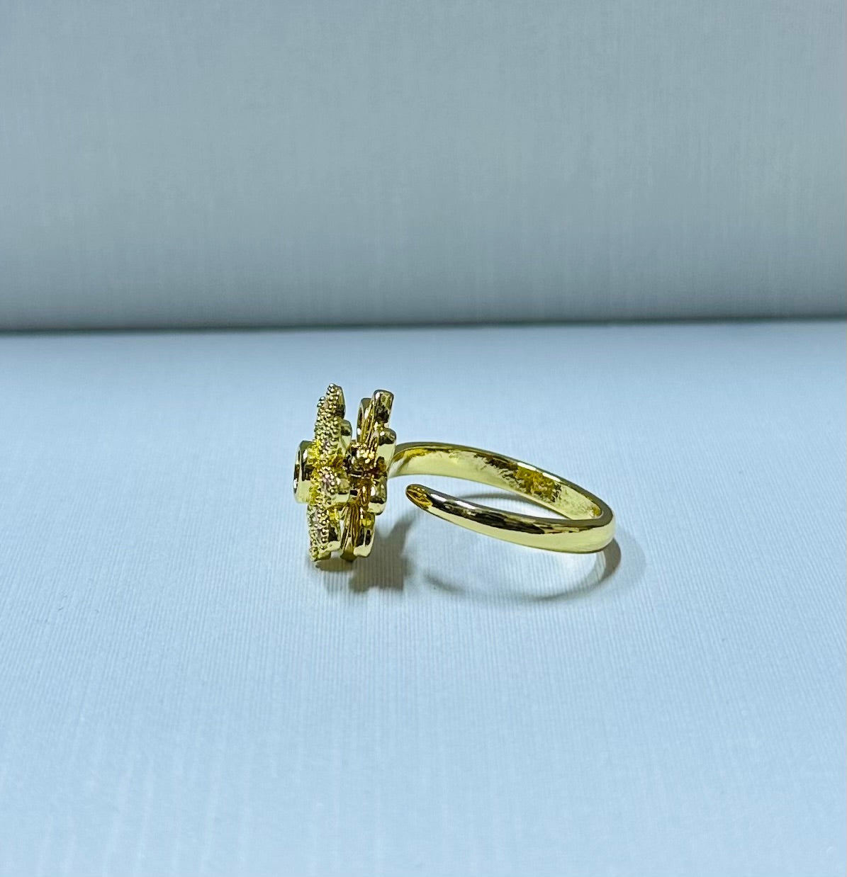 Anillo flor giratorio regulable