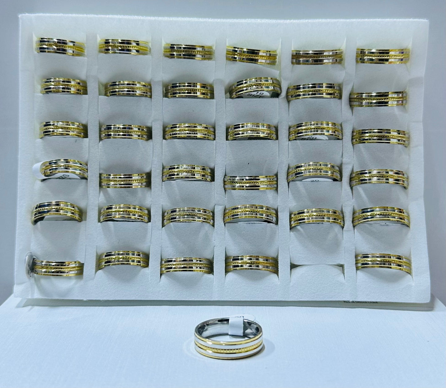 Anillo bicolor plateado y dorado (por 36 und)