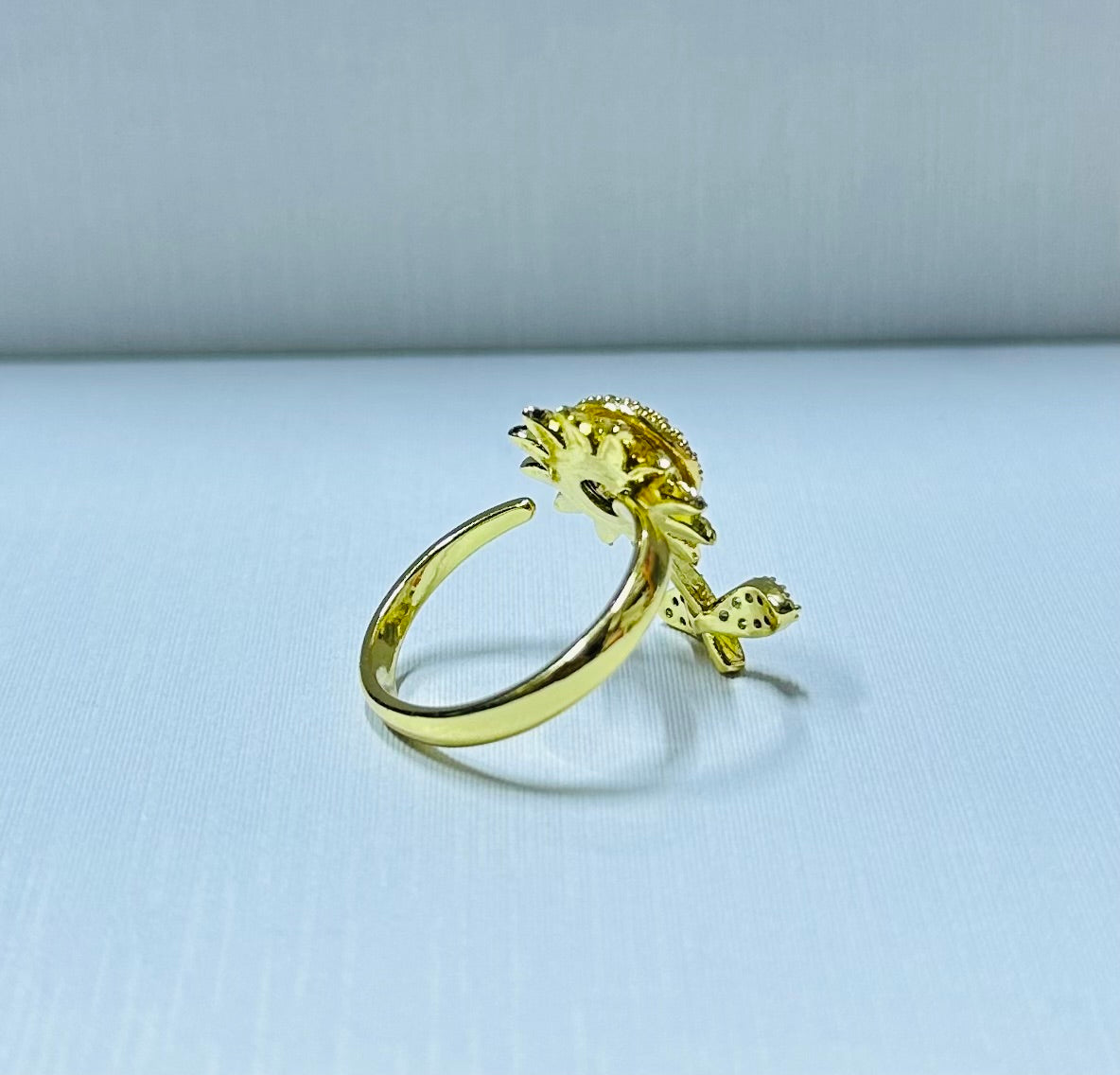Anillo girasol giratorio regulable