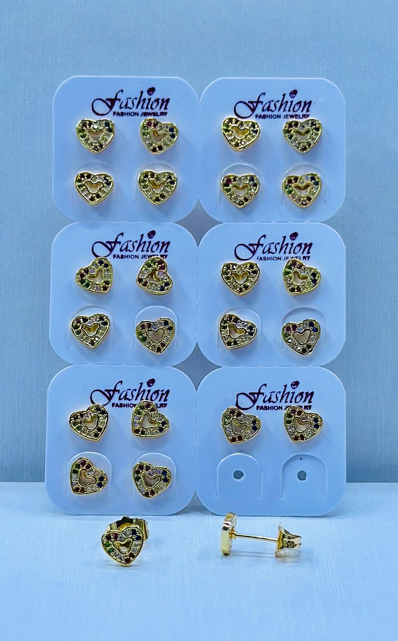 Arete bronce enchapado por 12 pares.