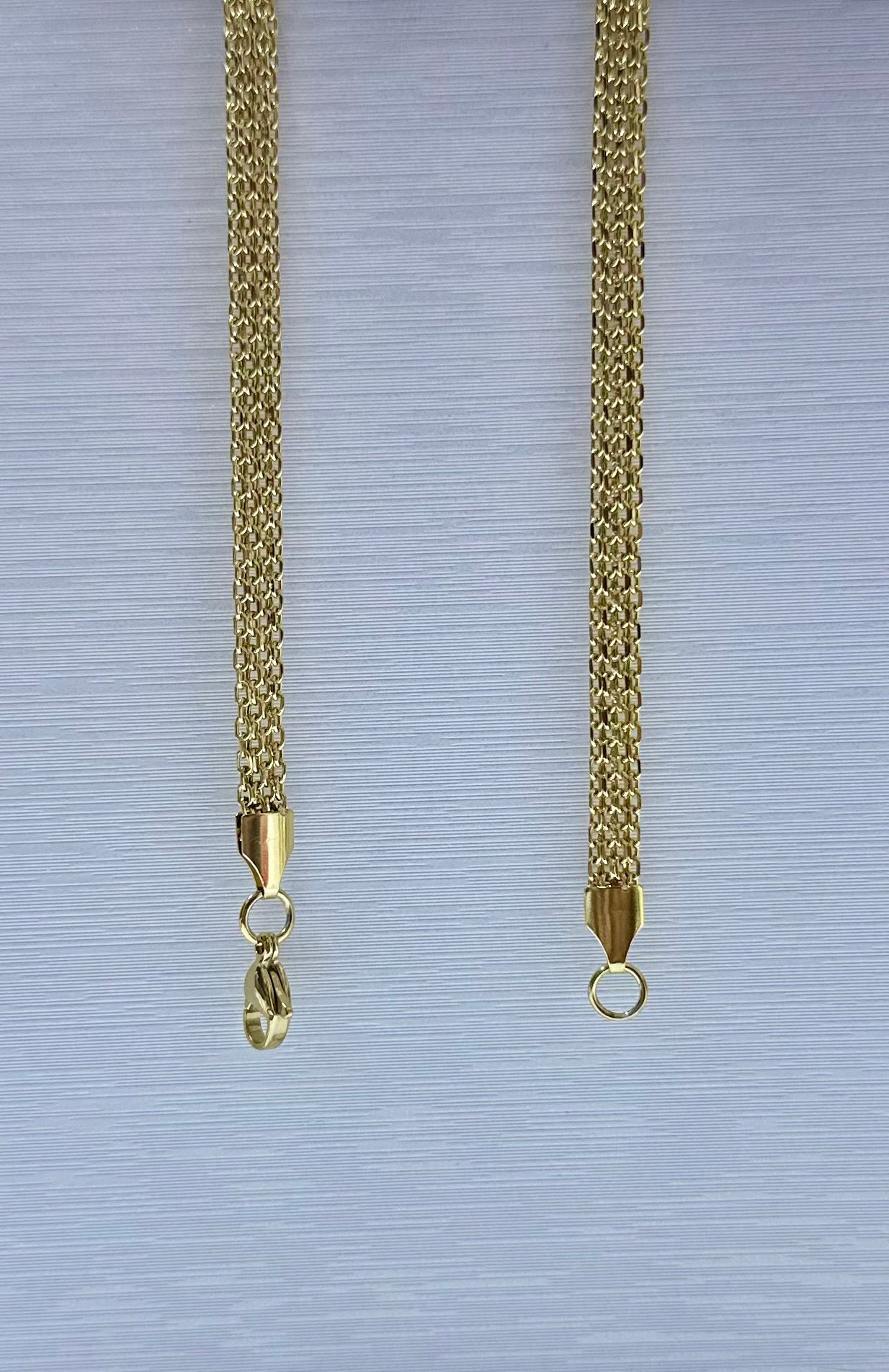 Collar en acero dorado de varón (60cm)