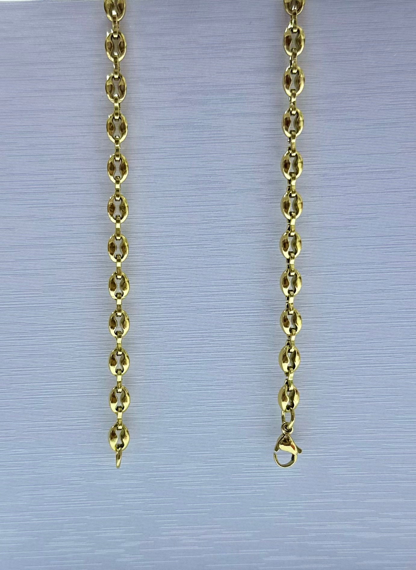 Collar en acero dorado de varón (60cm)