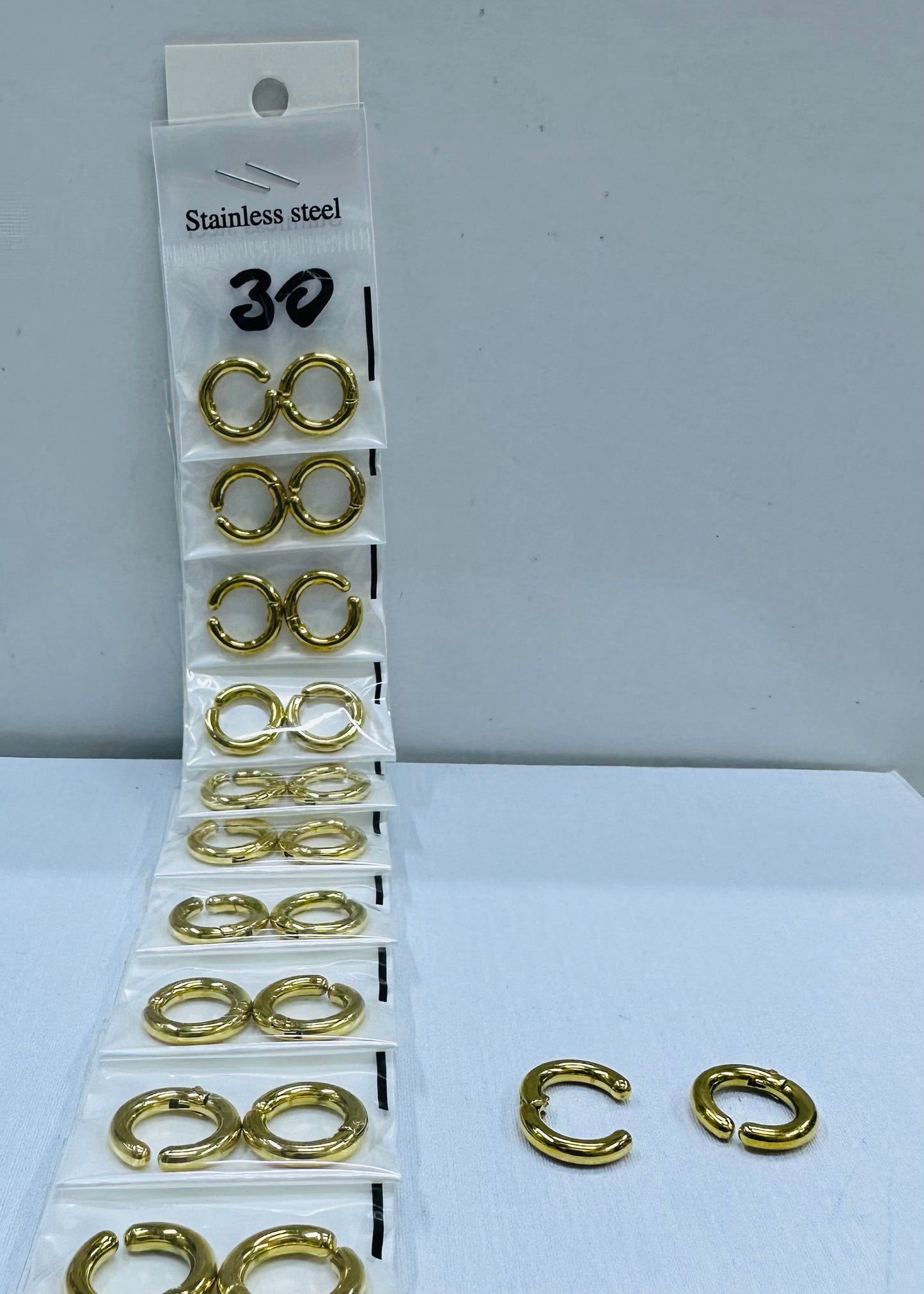 Arete argolla dorado a presión, por 12 pares