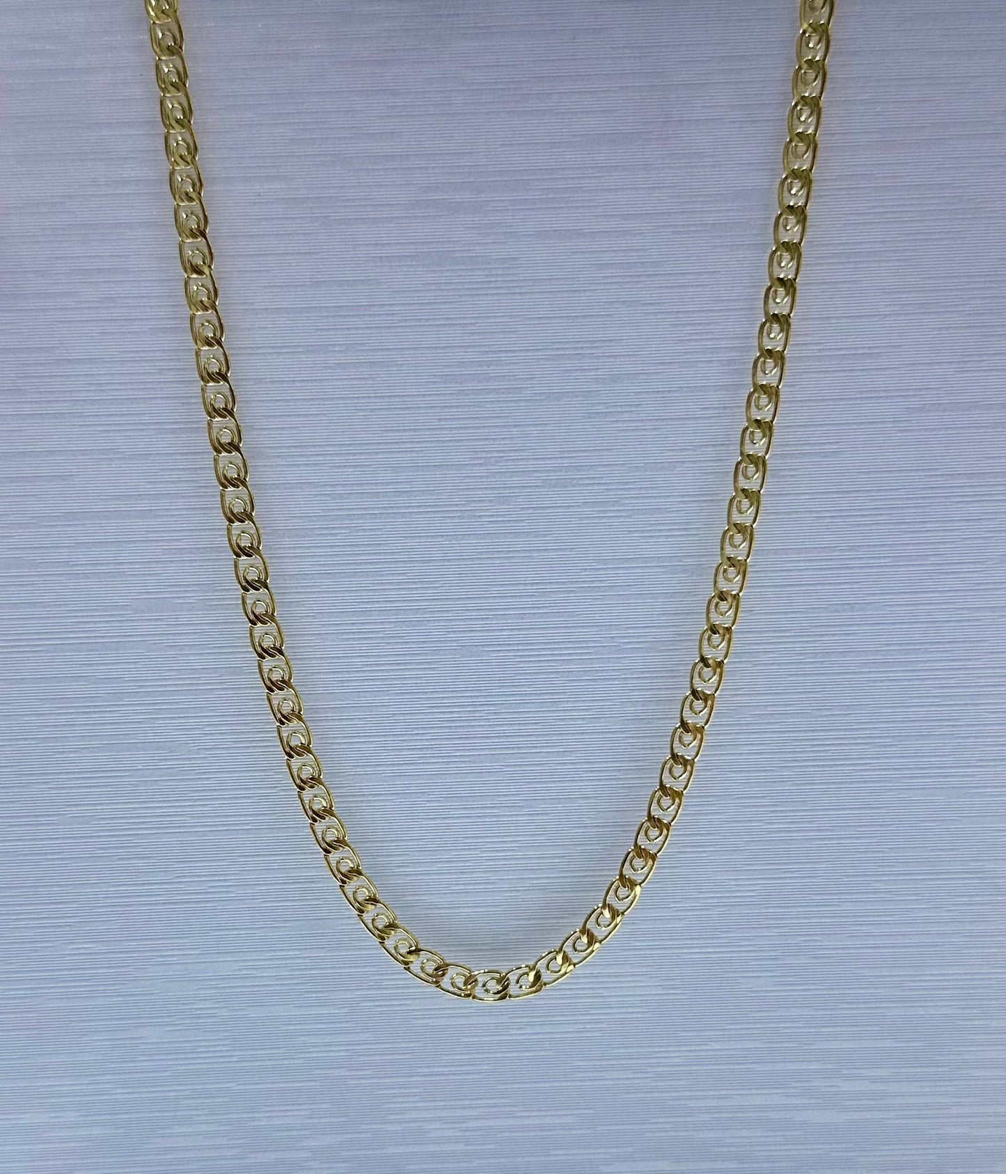 Collar en acero dorado de varón (60cm)