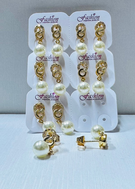 Arete con perla y piedra de zircon por 6 pares.