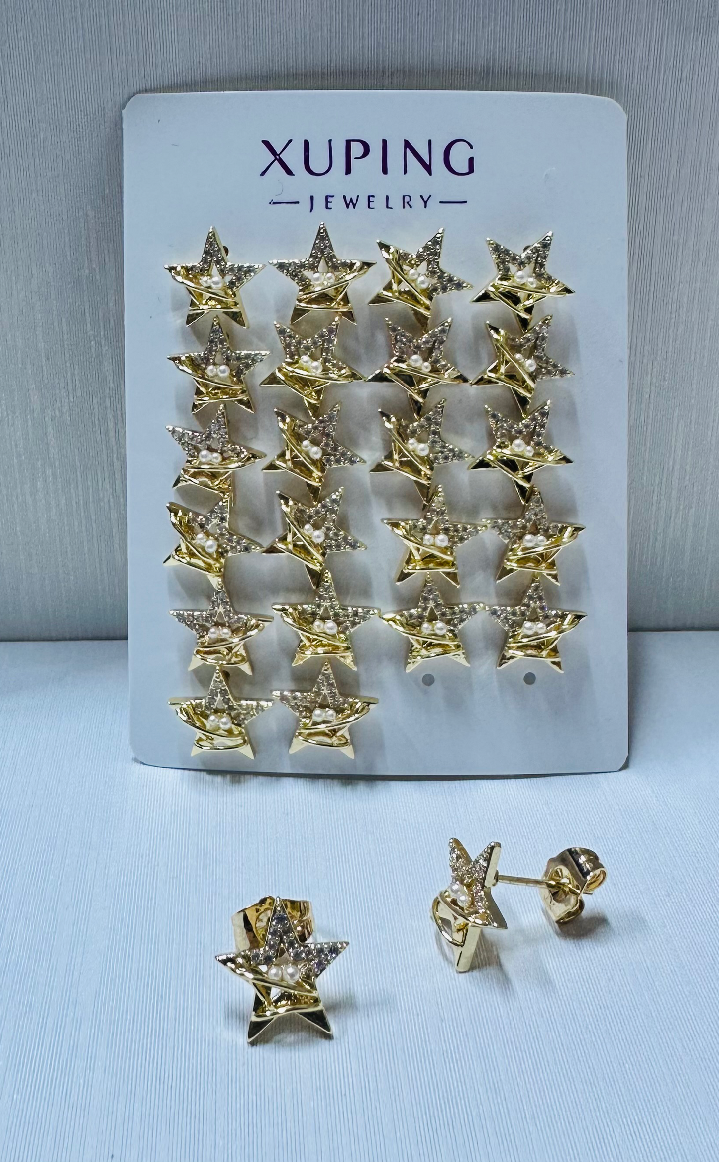 Arete estrella en xuping (por 1 par)