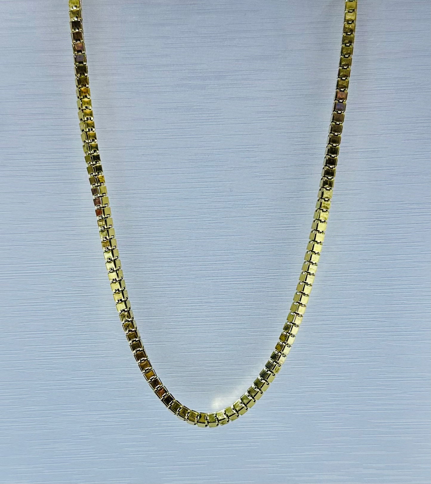 Collar en acero dorado de varón (60cm)
