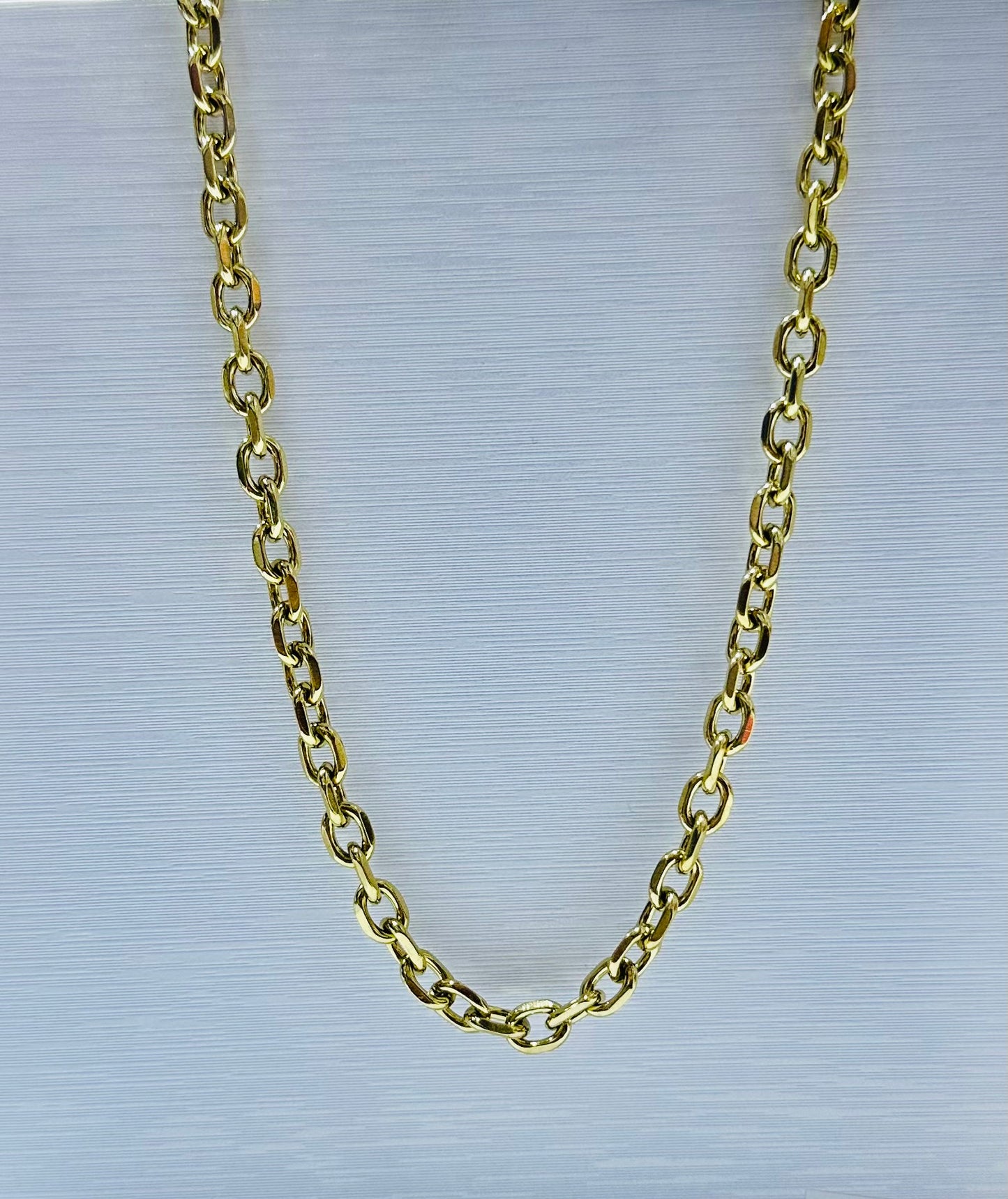 Collar en acero dorado de varón (60cm)