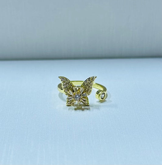 Anillo mariposa giratorio regulable