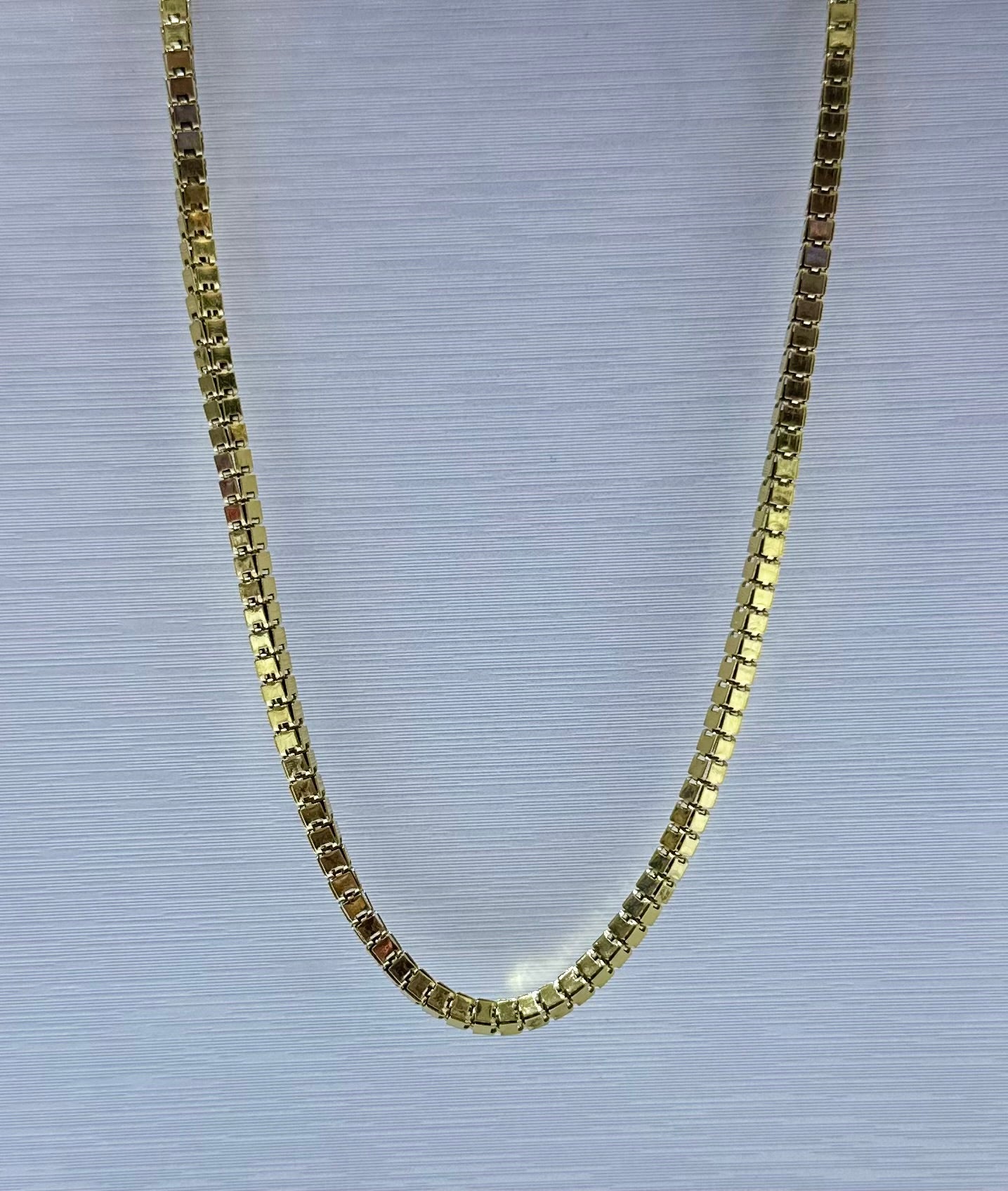 Collar en acero dorado de varón (60cm)