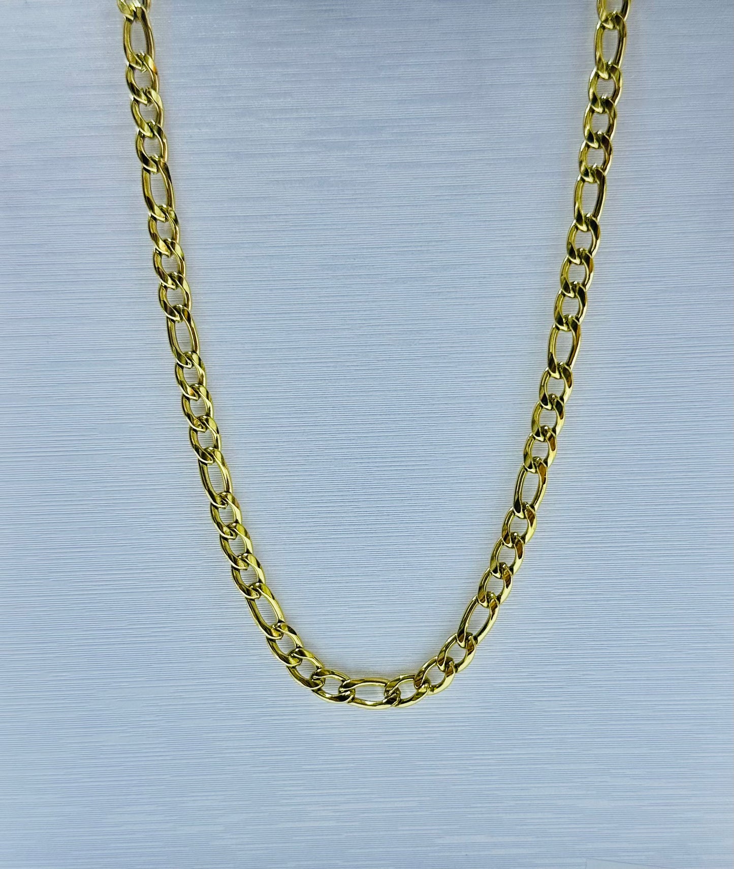 Collar cartier en acero dorado de varón #4 (60cm) por docena.