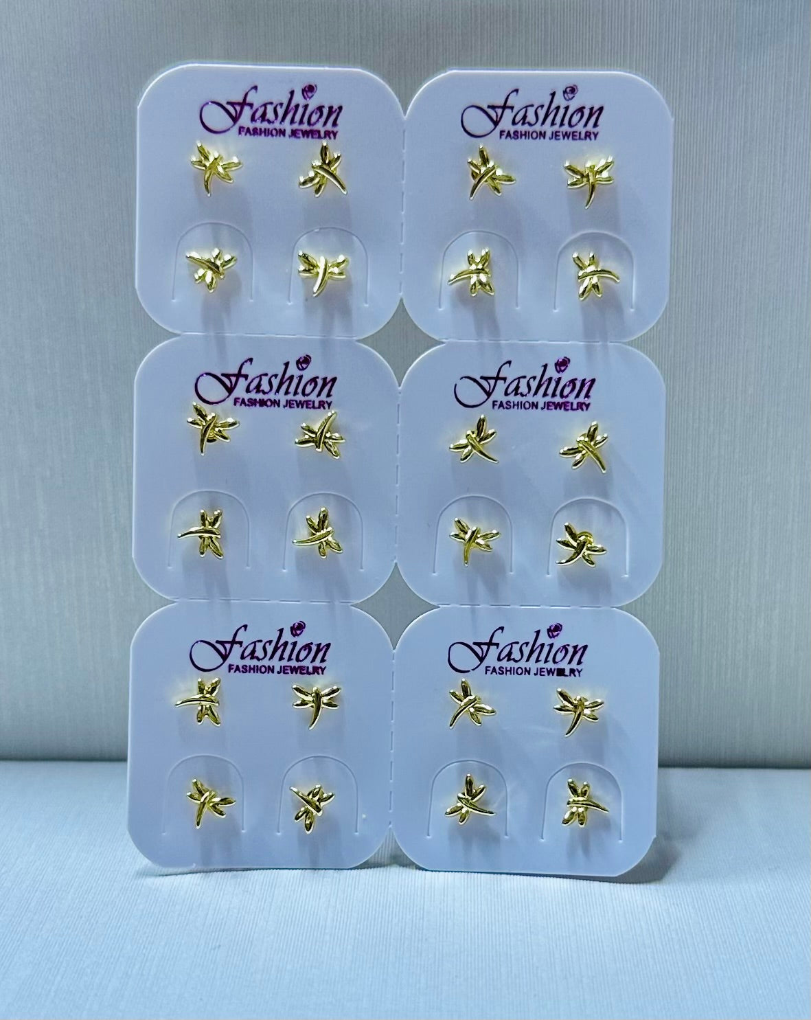 Arete miniatura libélula por 12 pares.