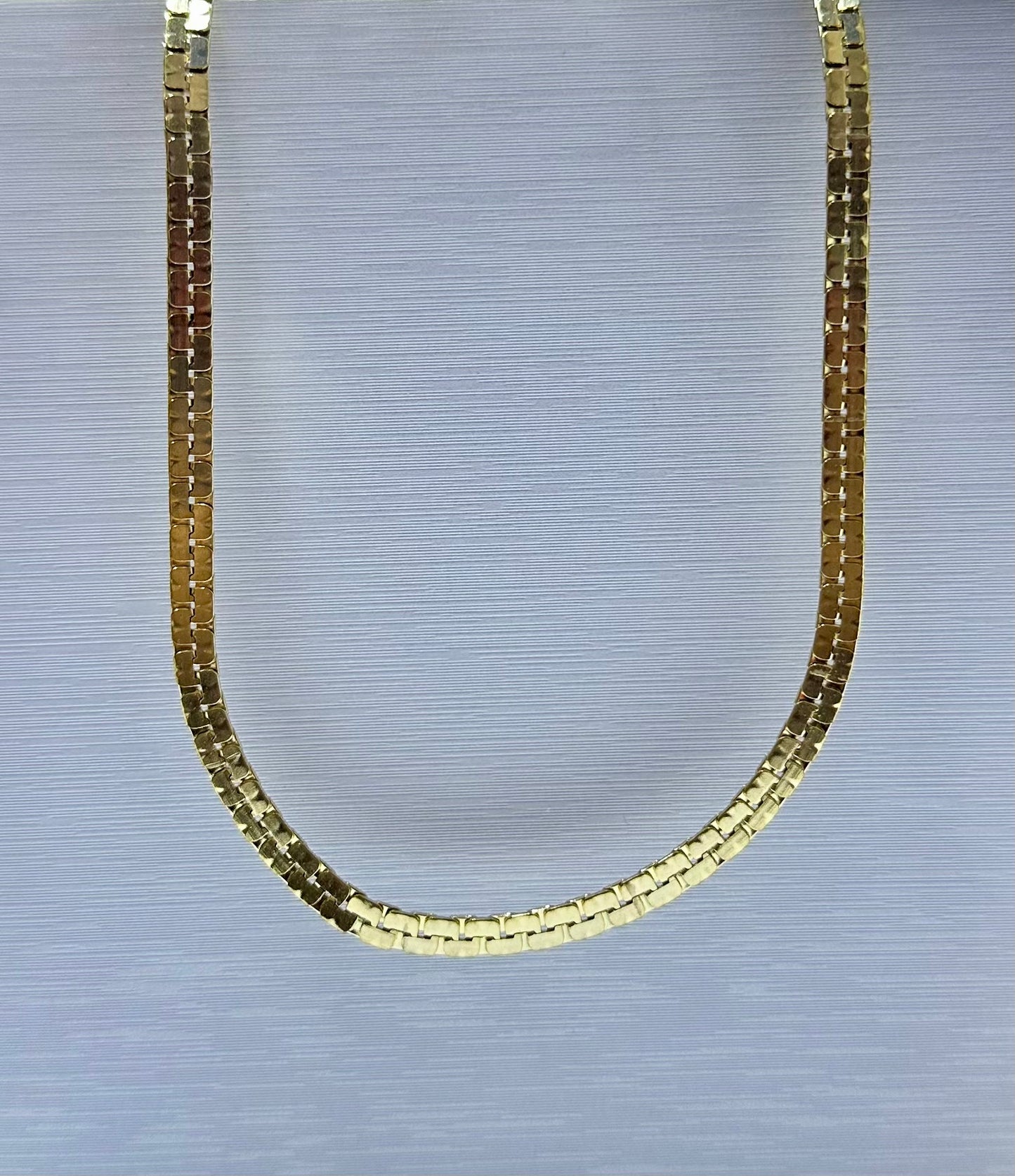 Collar en acero dorado de varón (60cm)