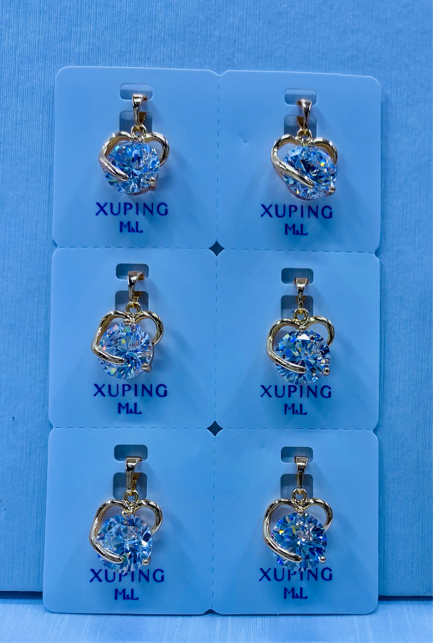 Dije Xuping M&L color 18k rose por 1 und.