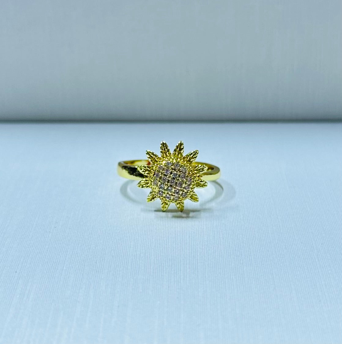 Anillo girasol giratorio regulable