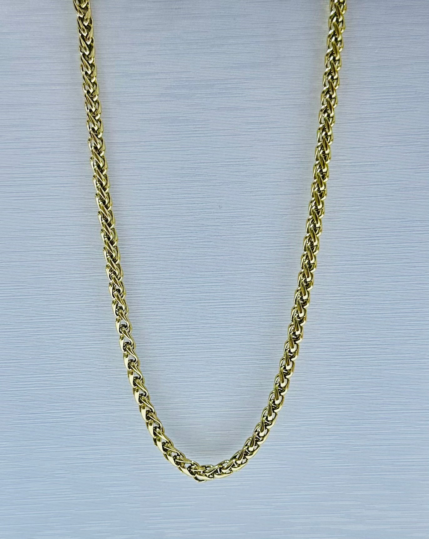 Collar en acero dorado de varón (60cm)