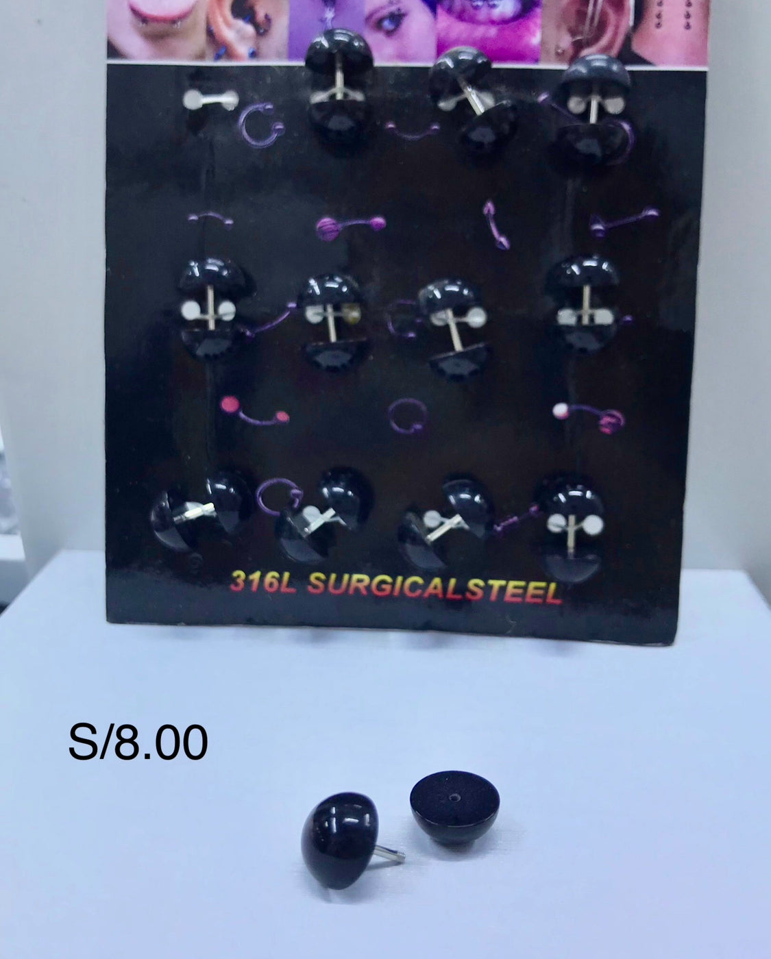 Piercing negro por blíster de 12 und.