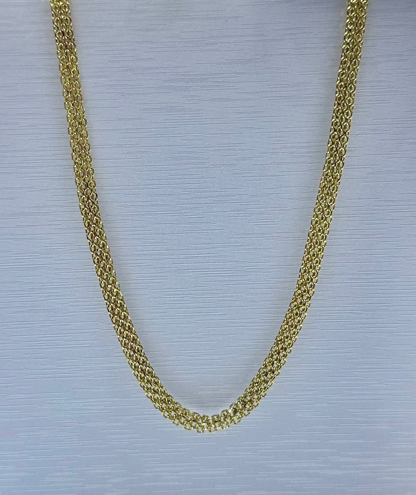 Collar en acero dorado de varón (60cm)