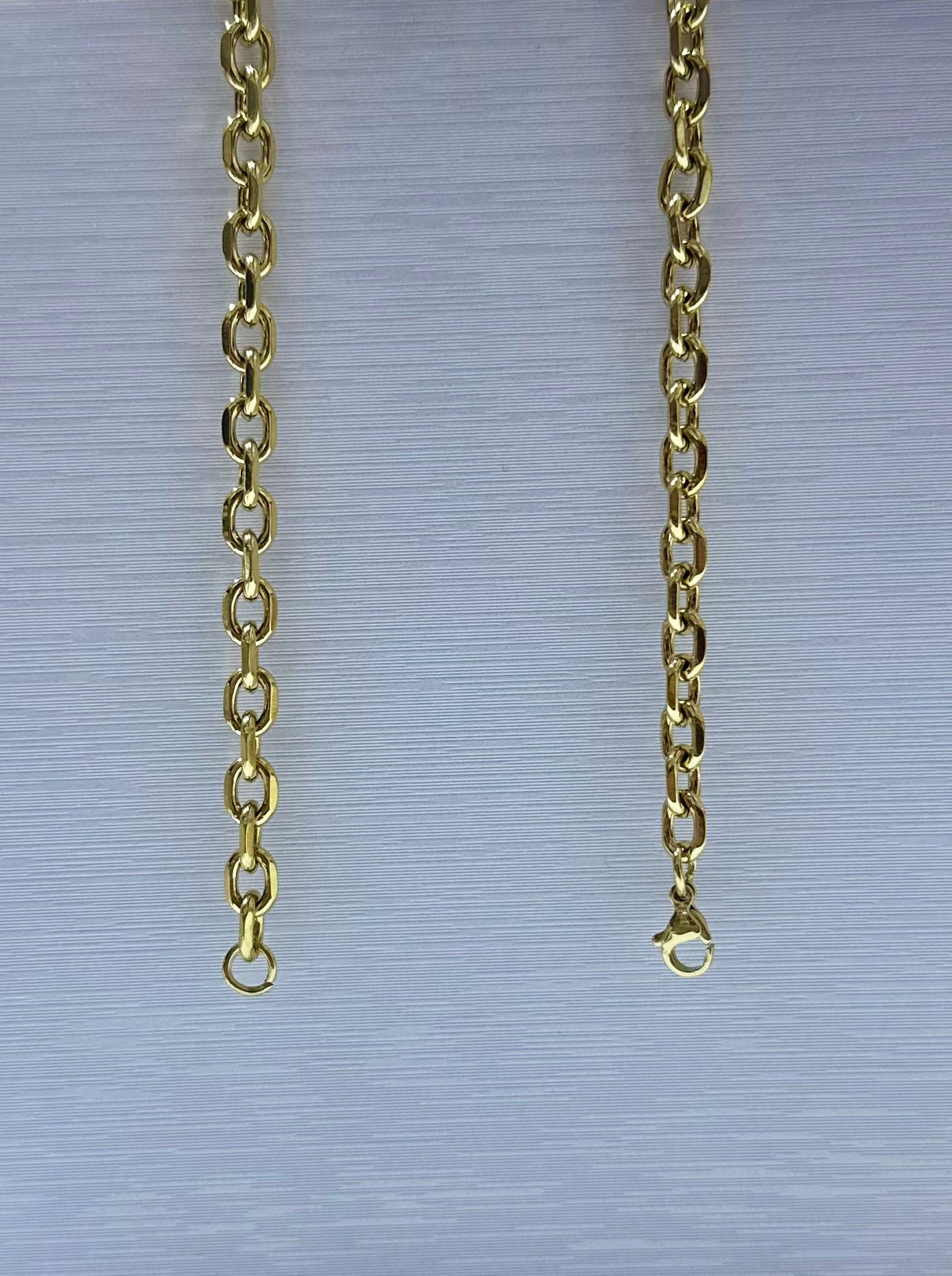 Collar en acero dorado de varón (60cm)