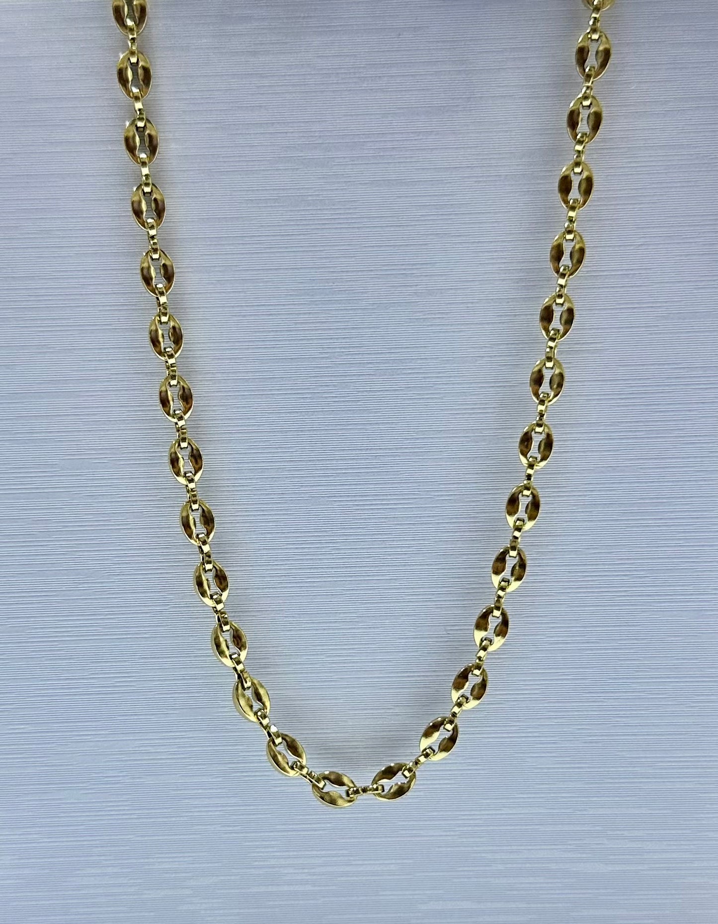 Collar en acero dorado de varón (60cm)