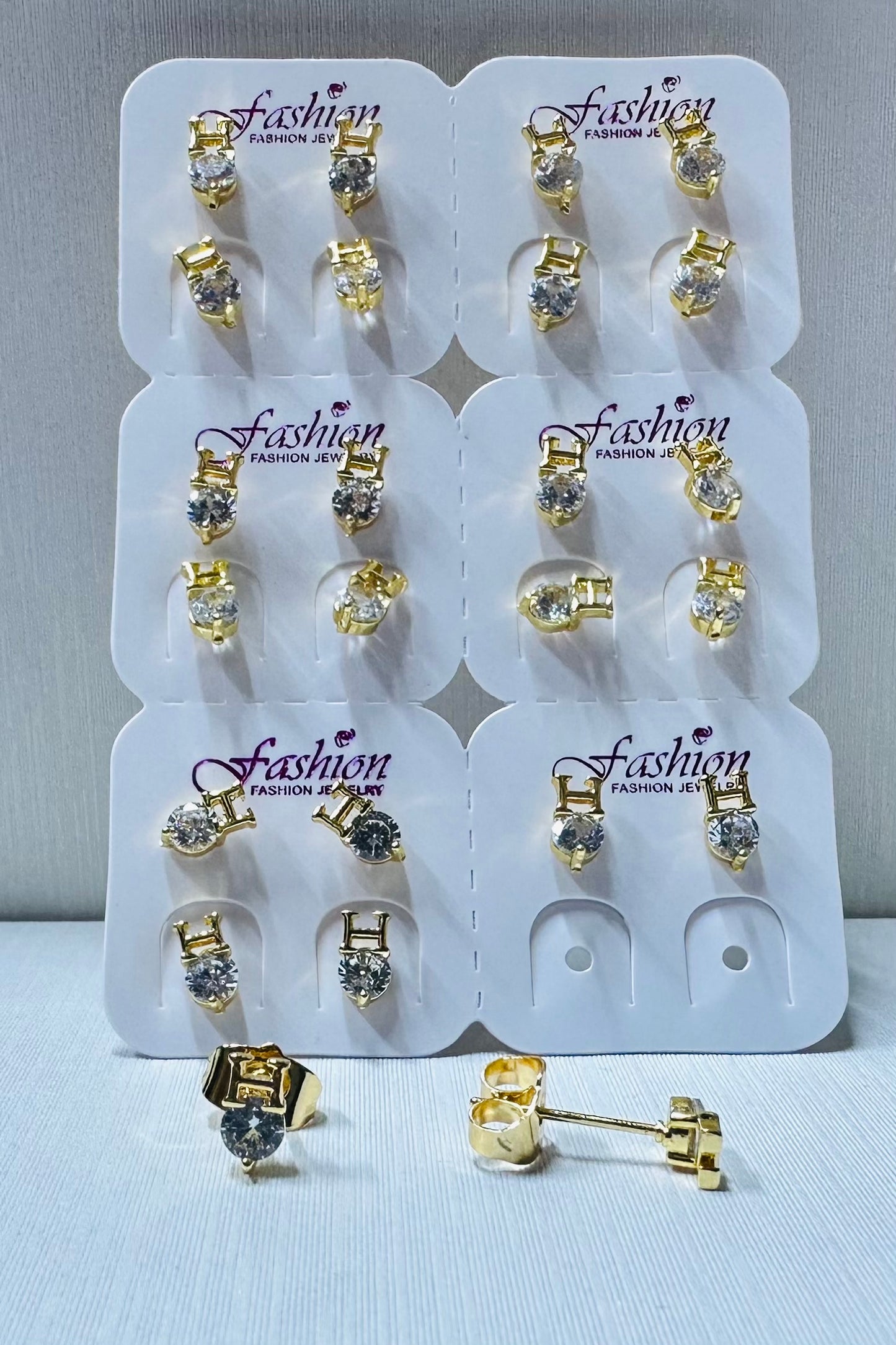 Arete con piedra de zircon