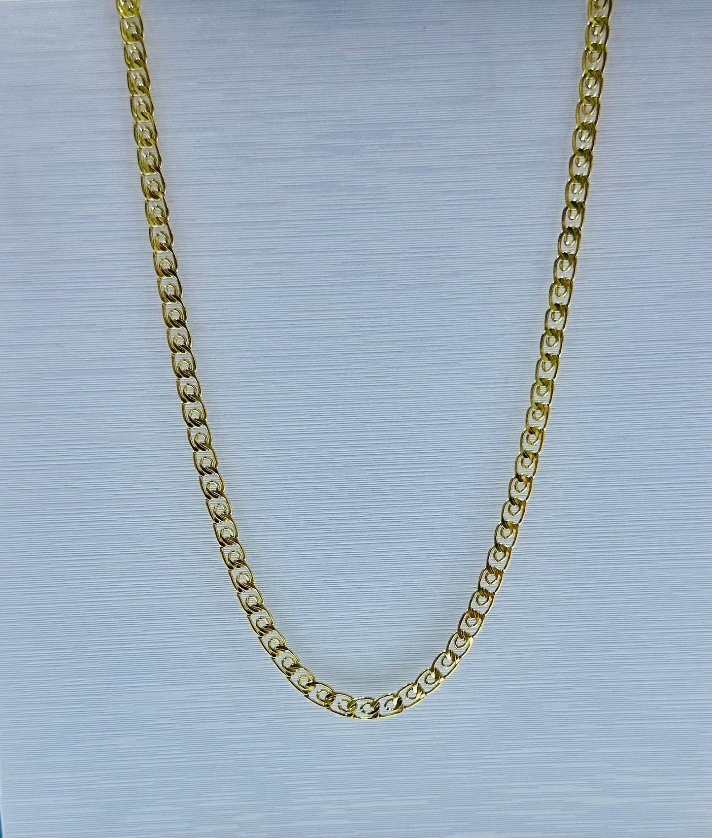 Collar en acero dorado de varón (60cm)