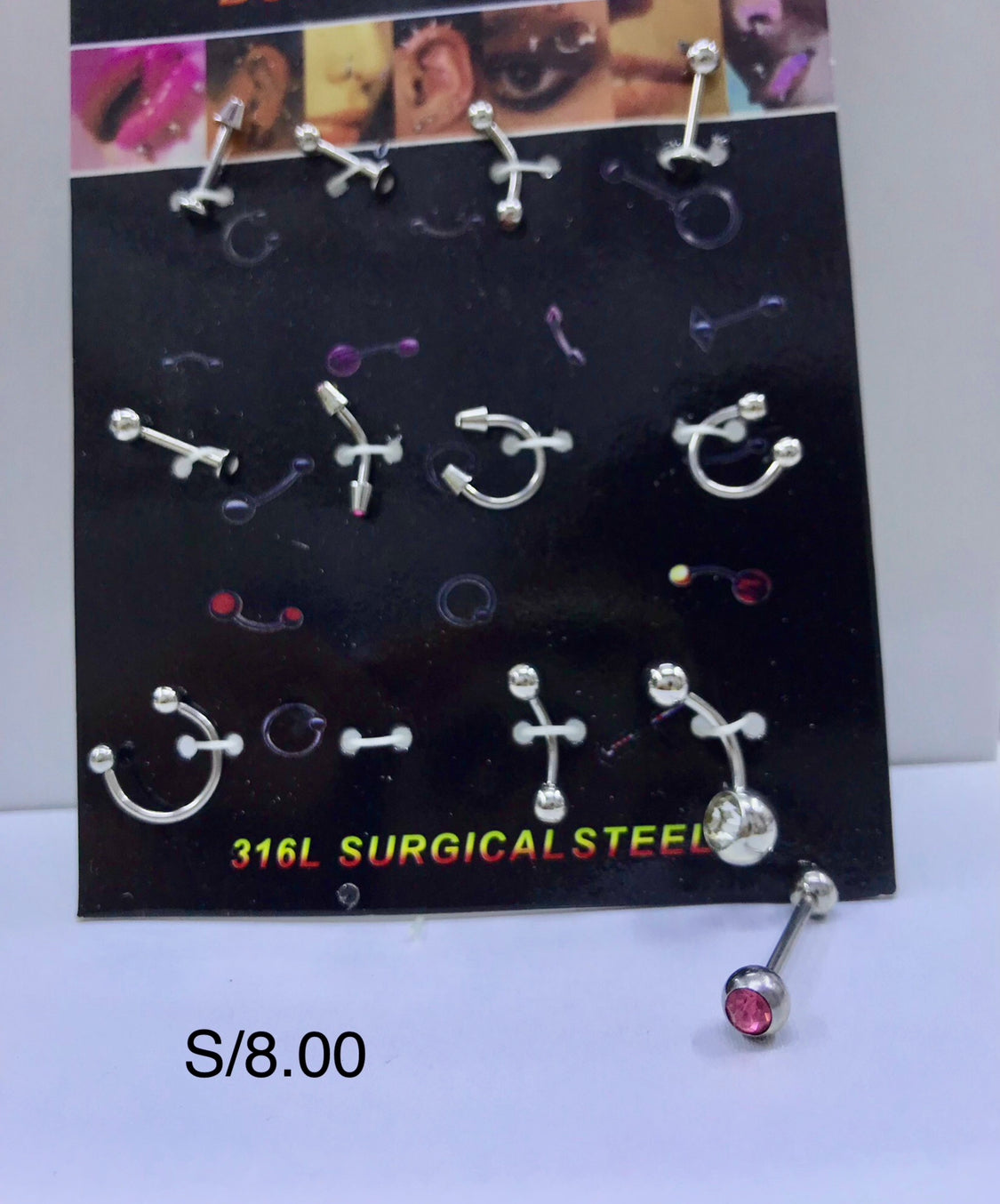 Piercing plateado por blíster de 12 und.