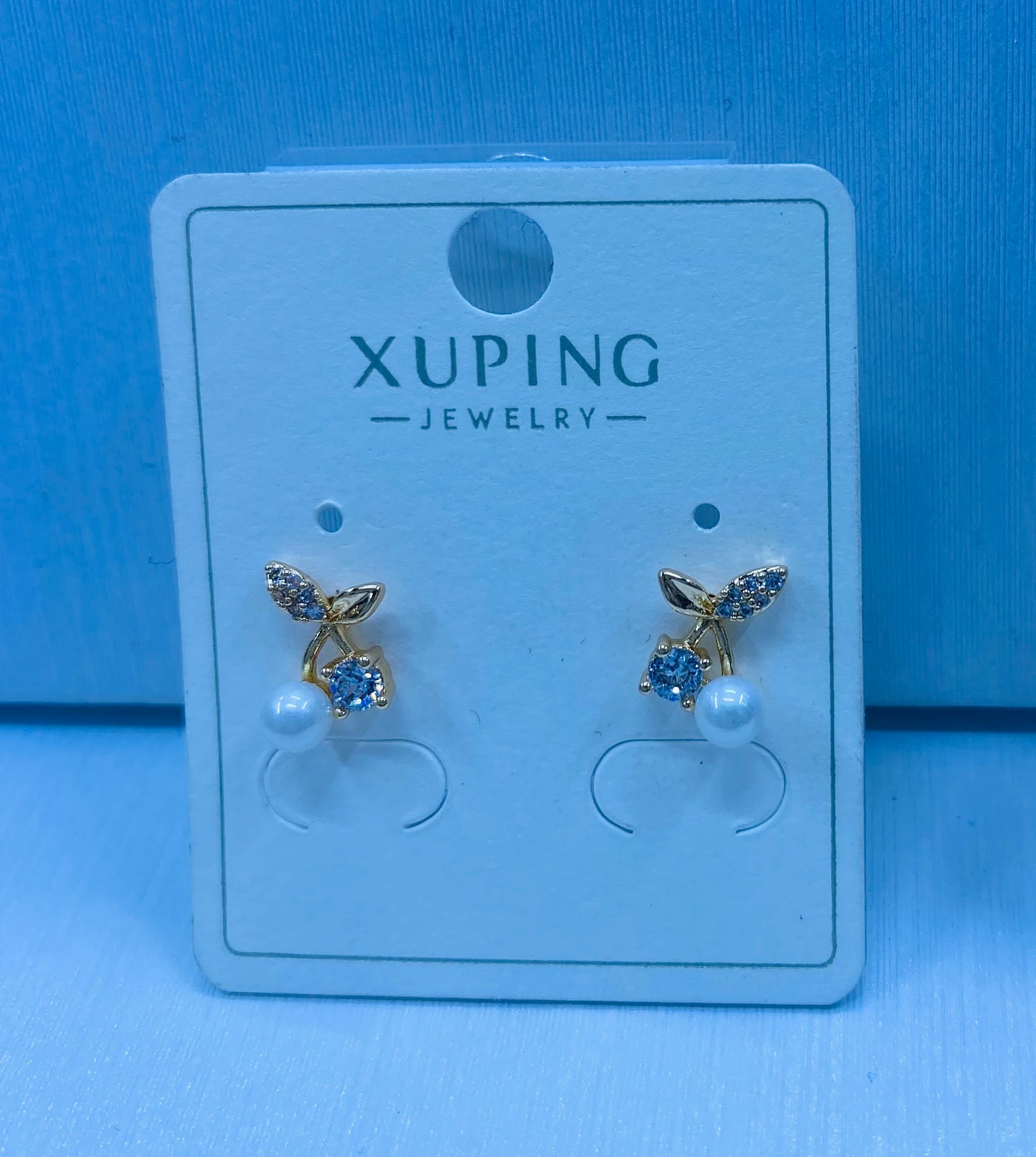 Arete xuping en color 18k rosa