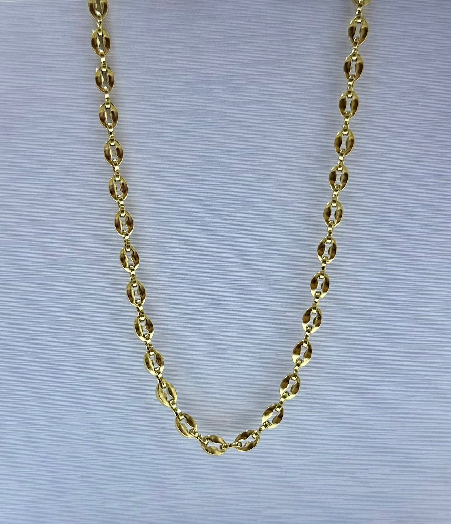 Collar en acero dorado de varón (60cm)