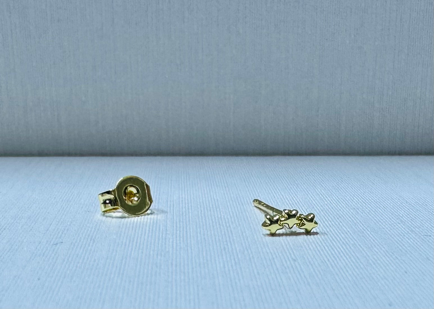 Arete miniatura estrella por 12 pares.