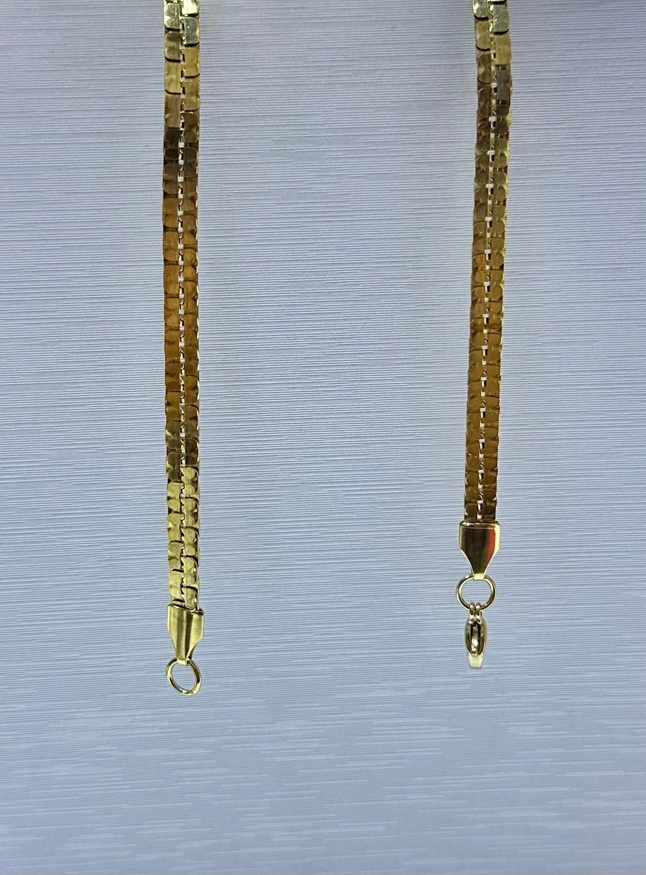 Collar en acero dorado de varón (60cm)