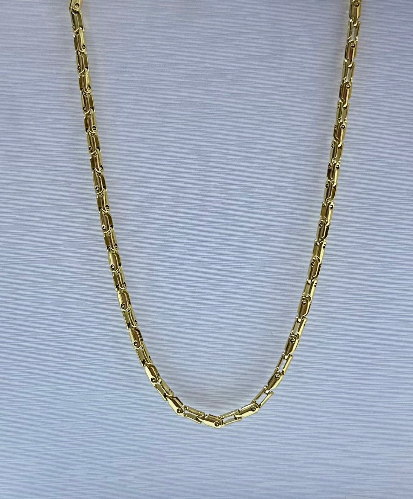 Collar en acero dorado de varón (60cm)