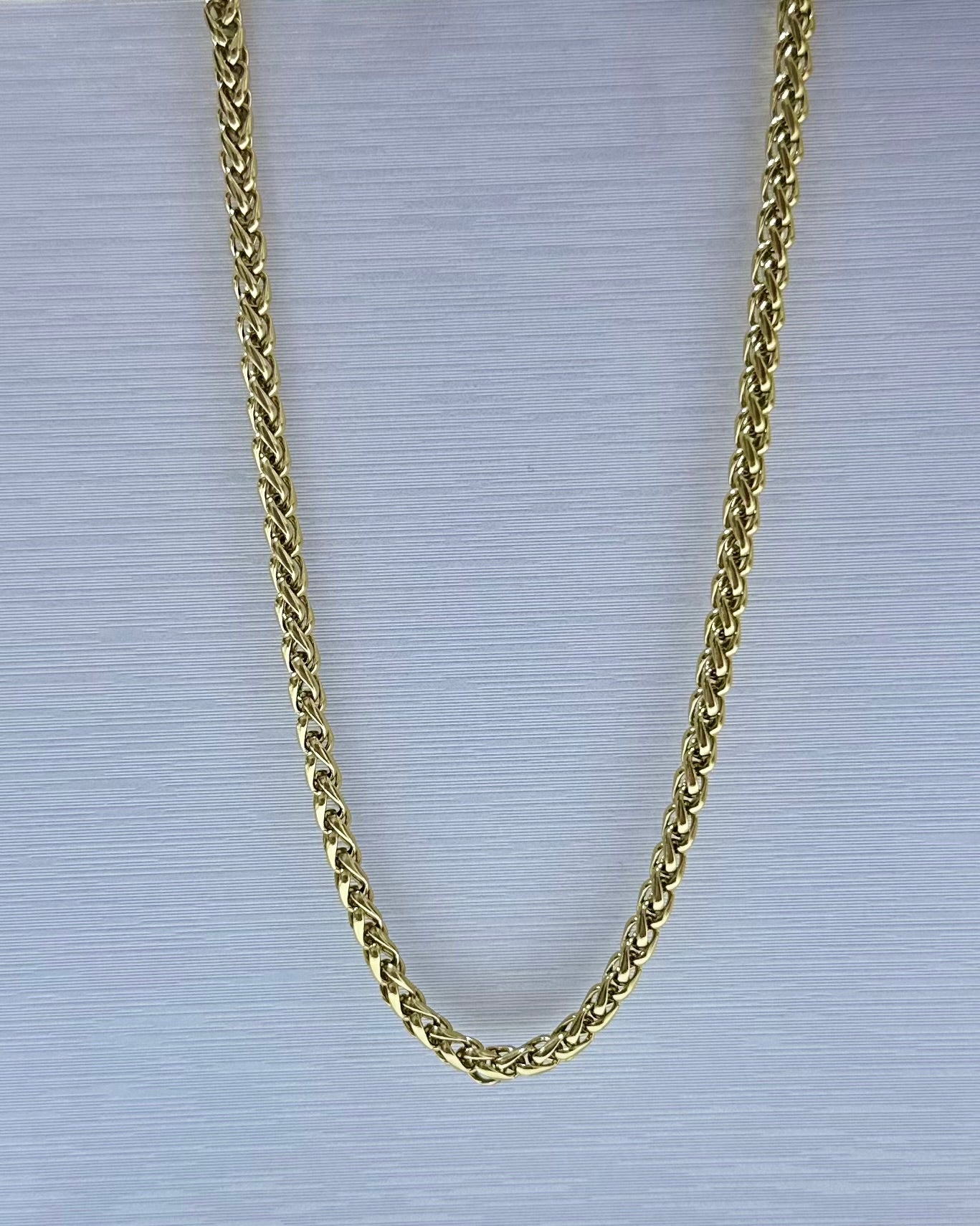 Collar en acero dorado de varón (60cm)