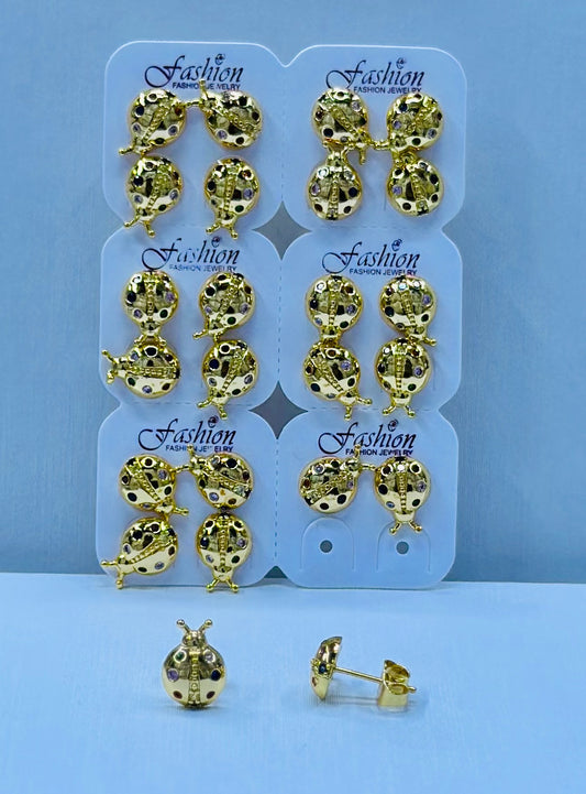 Arete bronce enchapado por 12 pares.